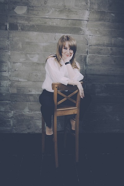 sitting in chair could turn on a woman